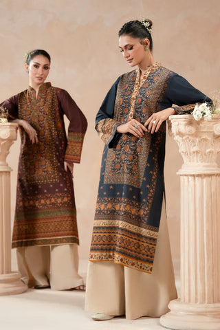 Woman wearing a traditional blue printed kurta with a beige background