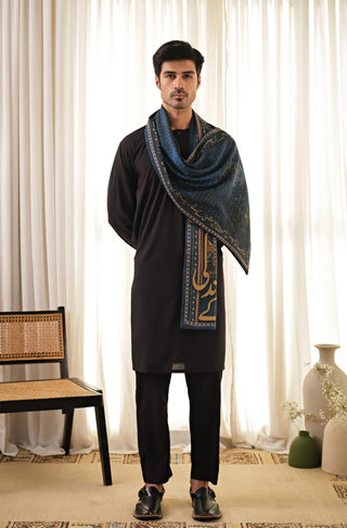 Wrapped Style of Manto's Unisex Double Sided Blue Chirag Stole featuring Urdu Calligraphy