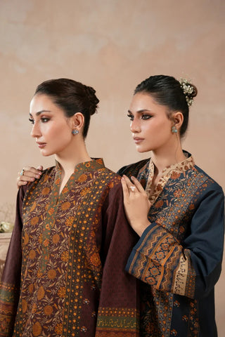 Woman wearing a traditional blue printed kurta with a beige background